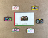 All our retro camera enamel pin designs. Created by Kimmy W